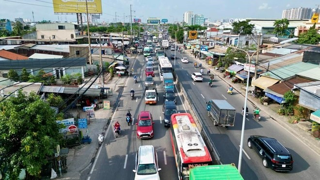 'Đầu tàu' kinh tế Việt Nam chi hơn 27.000 tỷ mở rộng tuyến đường quốc lộ đi 2 tỉnh biên giới- Ảnh 1.