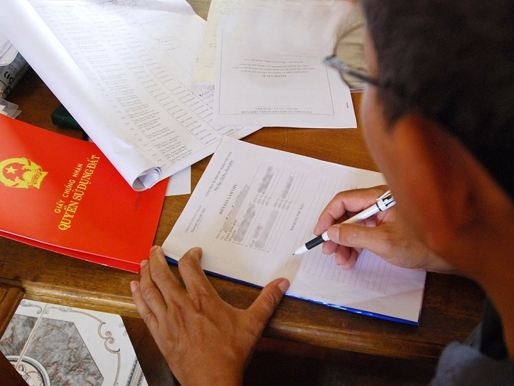 Sáp nhập địa giới hành chính: Người dân không cần làm lại sổ đỏ, sổ hồng - ảnh 2
